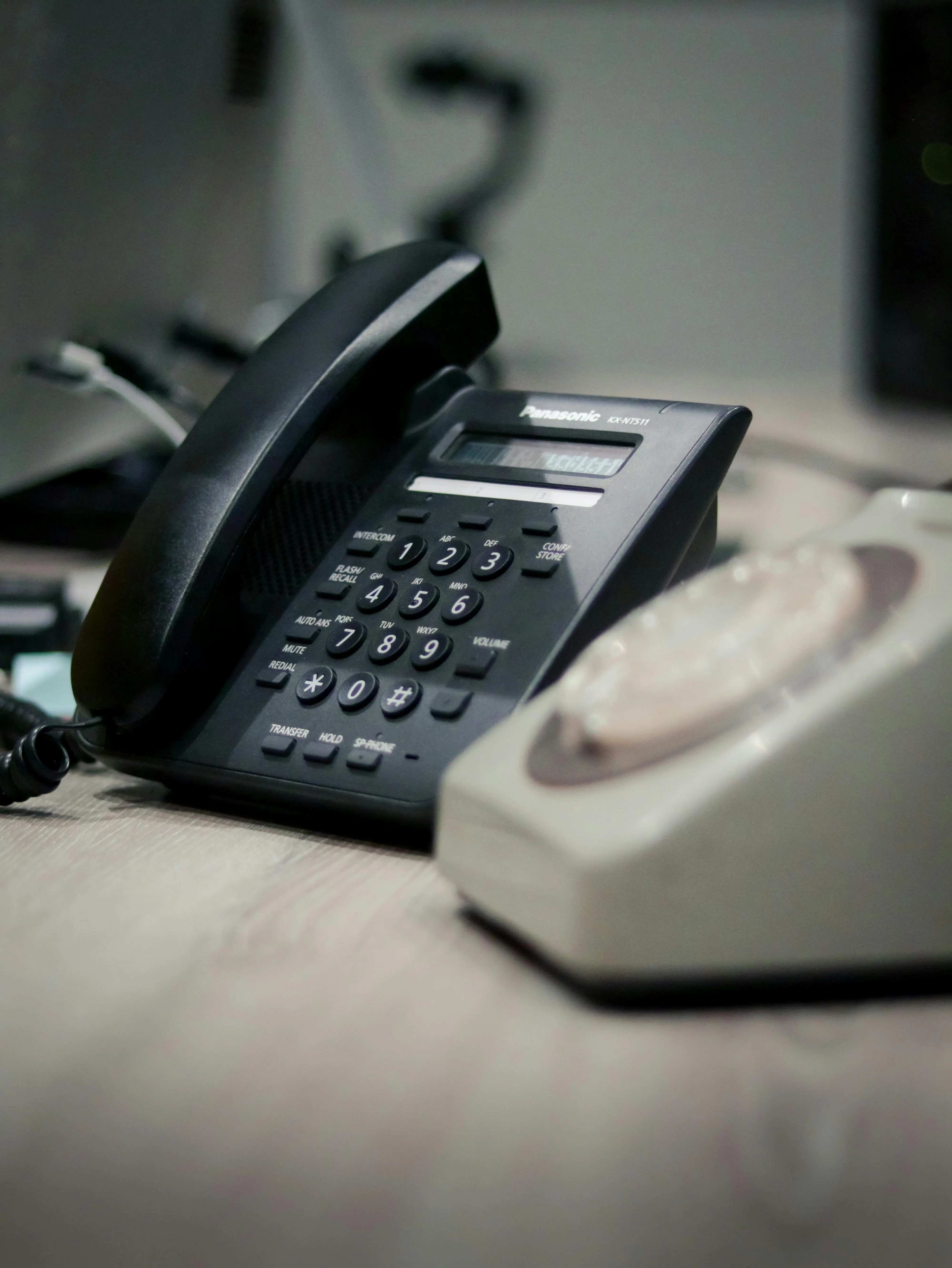 Classic telephone handset representing voice communication